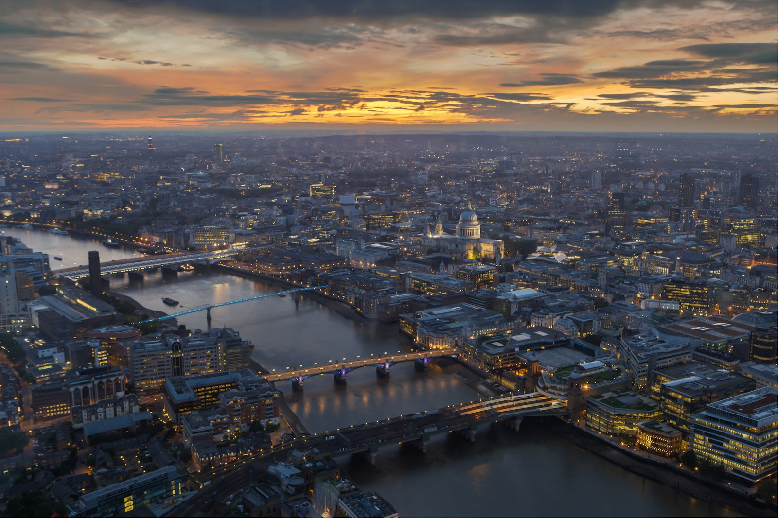 The Thames, St Paul's and the City of London from the air at dusk
